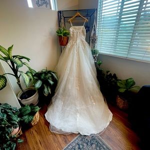 Vintage off white wedding dress. Tulle, intricate beading.  Size 12